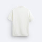 Polo en tricot classique en blanc