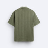 Polo structuré en tricot avec fermeture éclair