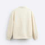 Pull beige avec col polo – Style décontracté avec élégance