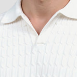 Polo en tricot blanc avec motif texturé