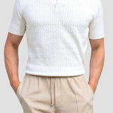 Polo en tricot blanc avec motif texturé