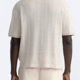 Polo structuré en tricot avec fermeture éclair