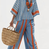 Valeria – haut strié terracotta sophistiqué et pantalons en lin