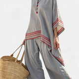 Rossella – blouse asymétrique sophistiquée et pantalons ethniques à jambes larges