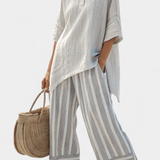 Fiorella – blouse asymétrique élégante et pantalons rayés