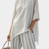 Fiorella – blouse asymétrique élégante et pantalons rayés
